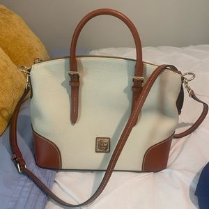 Brand new Dooney & Burke tote/shoulder bag never been used! Holds everything!